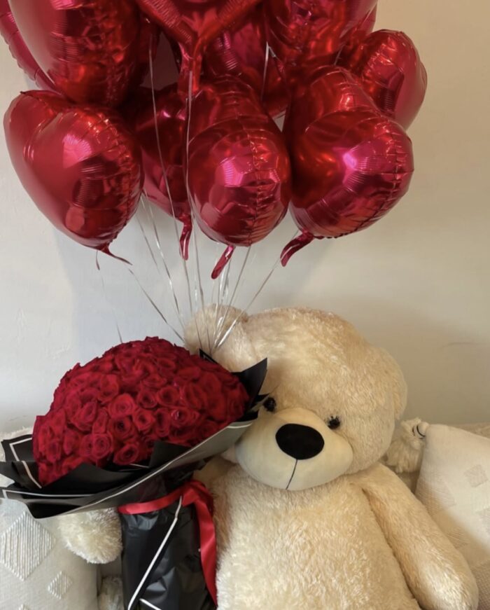 Bouquet of Red Roses and Teddy Bear