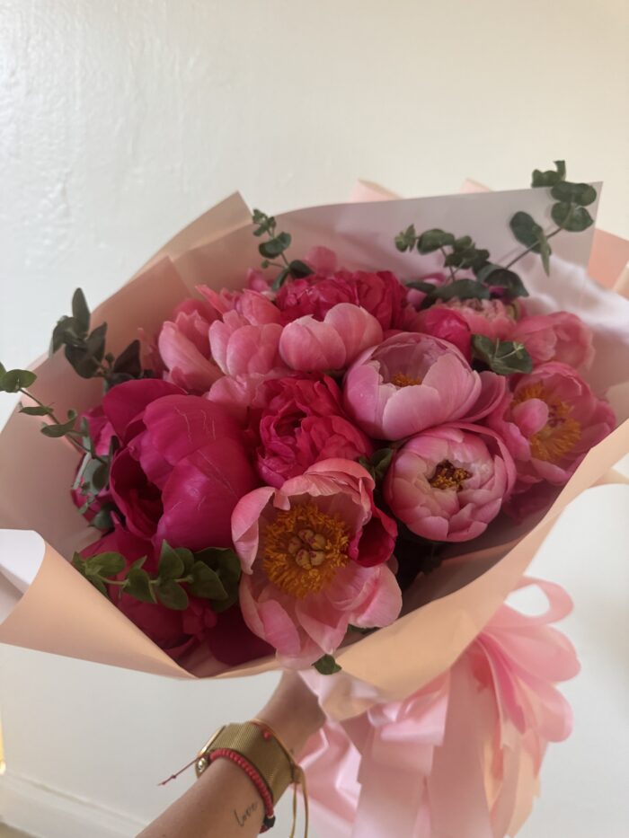 Bouquet of hot pink peonies.