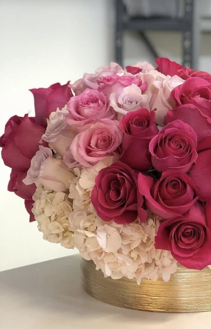 Arrangement of Pink Roses in a Ceramic Vase - Image 2